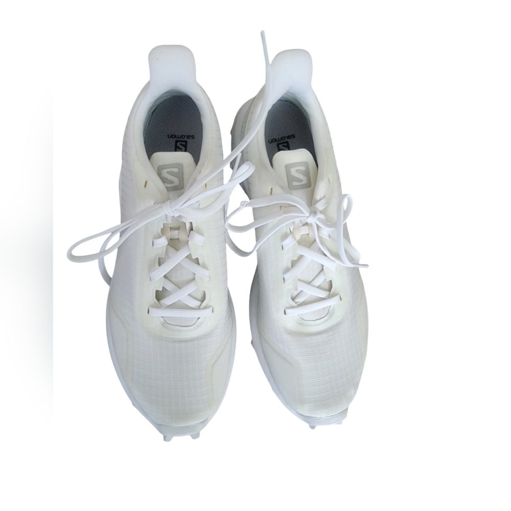 Fresh white Salomon running shoes